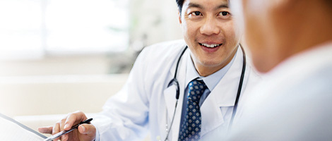 A doctor talking to a patient